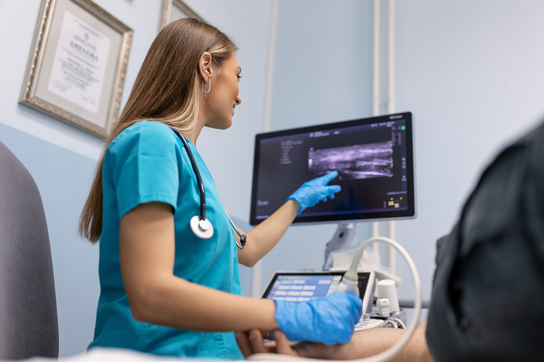 NHS nurse conducting ultrasound